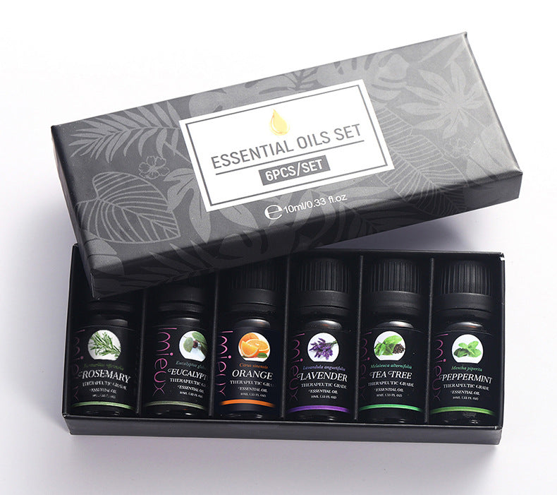 Organic 10ml essential oil set for stress relief, meditation, sleep aid, and natural home fragrance in elegant black botanical box
